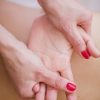 crop-therapist-massaging-hand-scaled-1