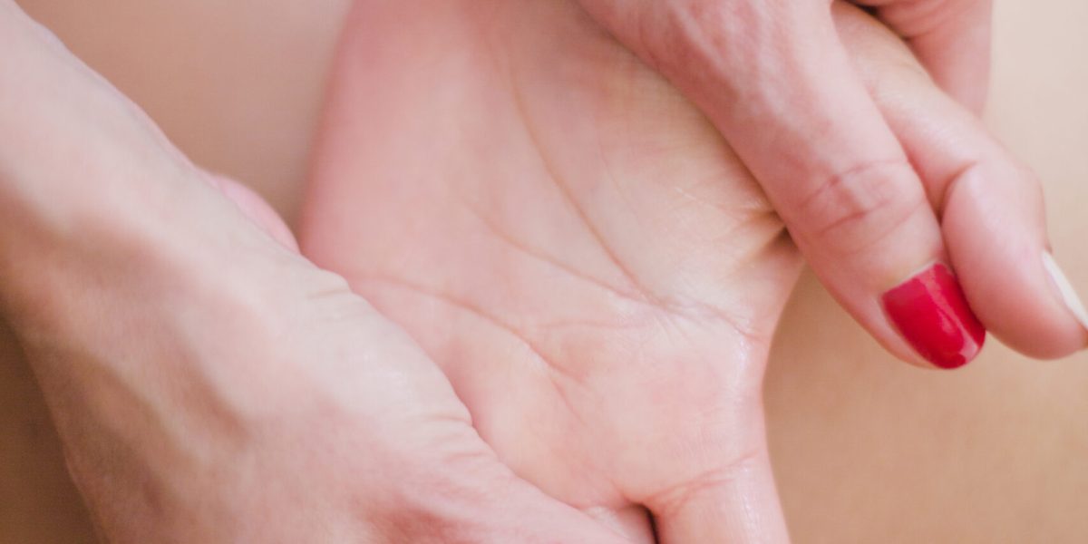 crop-therapist-massaging-hand-scaled-1