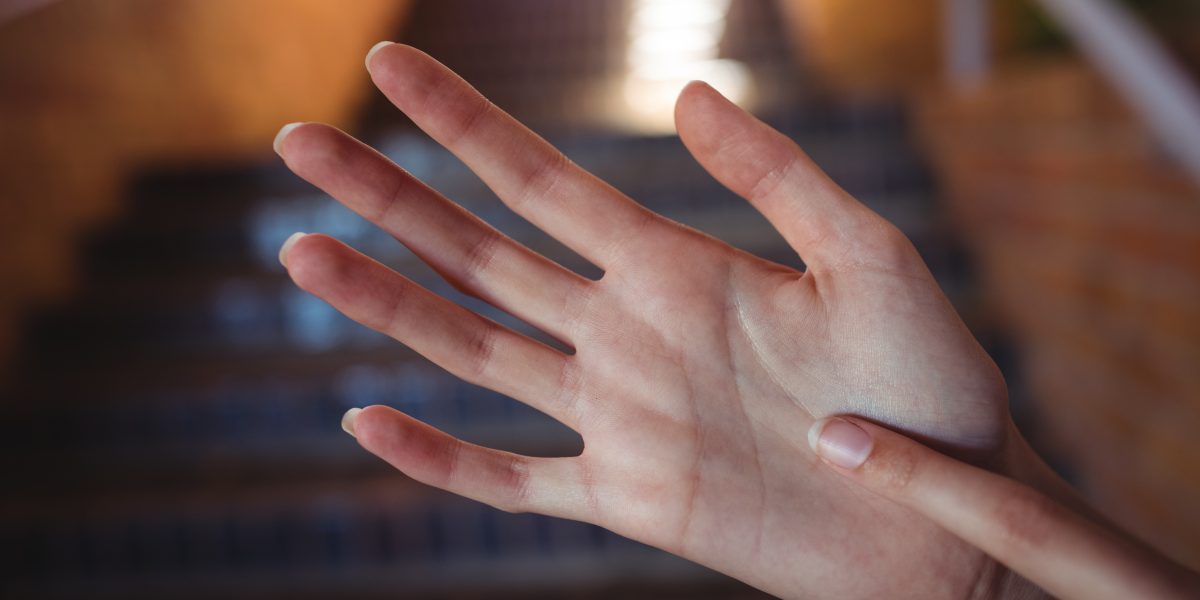 Schoolboy counting with fingers